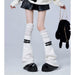 White socks with black buckles + white over the knee