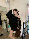 American design, niche leopard print stitching, tie-up off-the-shoulder sweater, women's sweet and spicy, loose and lazy knit top